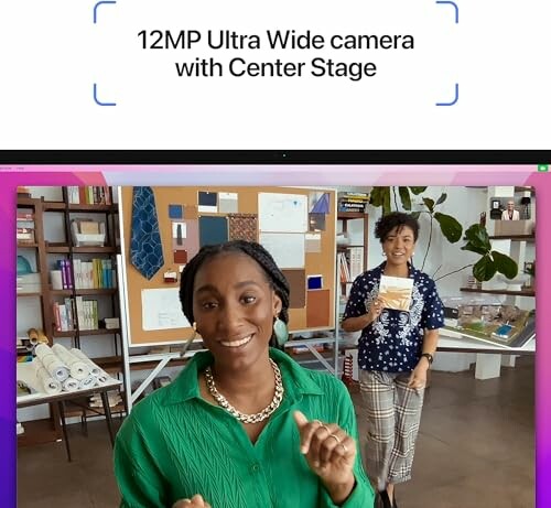 Two people demonstrating the 12MP Ultra Wide camera with Center Stage feature.