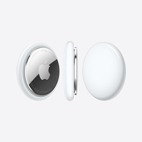 Apple AirTag shown from side and front.