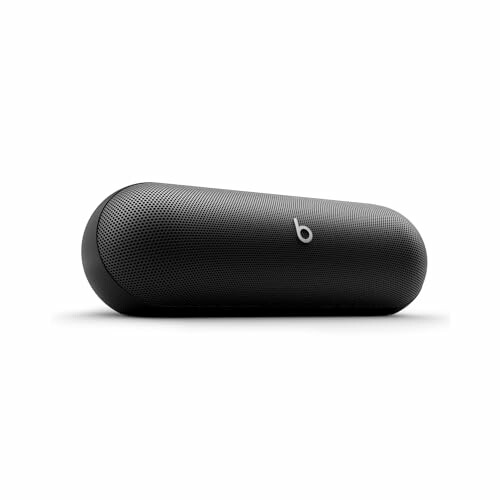 Black portable Bluetooth speaker on white background