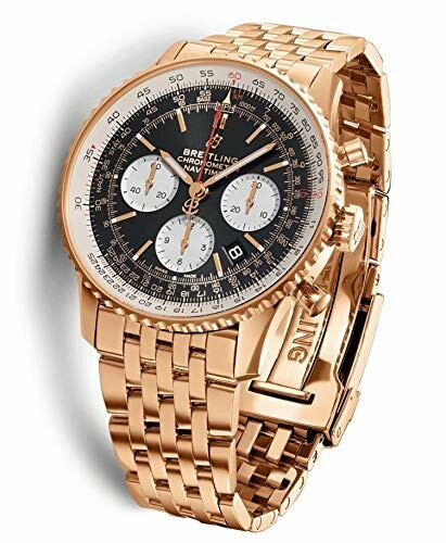 Breitling Navitimer gold watch with black dial and chronograph features.