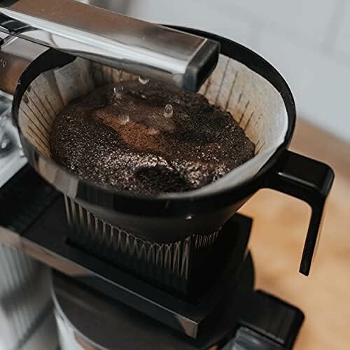 Close-up of coffee brewing in a filter