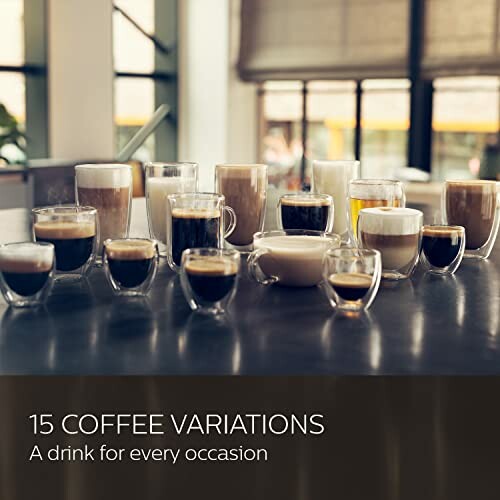 Assortment of 15 coffee drinks in various glass mugs on a table.