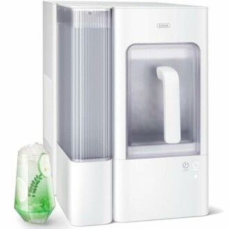 White countertop ice maker with drink