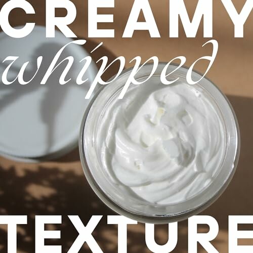 Jar of creamy whipped texture product with lid open