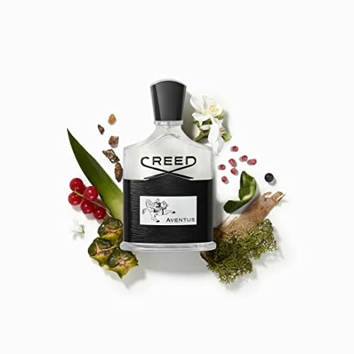 Creed Aventus perfume bottle with natural elements.