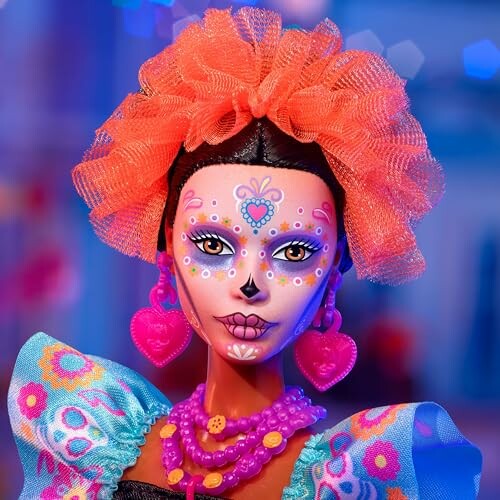 Colorful doll with Day of the Dead face paint and bright attire.