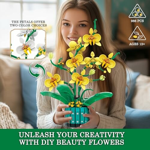 Woman holding a DIY flower building kit with yellow flowers.