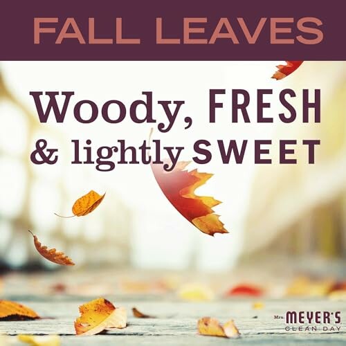 Colorful fall leaves with text about woody, fresh, and lightly sweet scent.