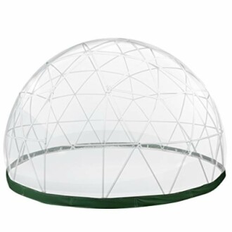 Transparent geodesic dome tent with a green base.