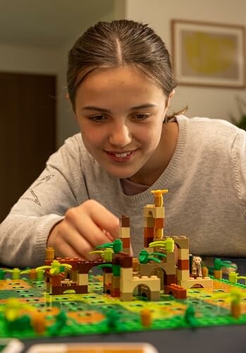 Girl playing with a LEGO set