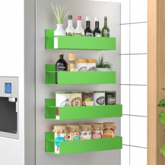 Green magnetic kitchen storage shelves with various bottles and containers.