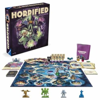 Horrified board game setup with box, game board, and pieces.