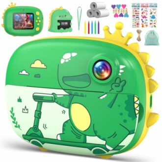 Green dinosaur-themed kids camera with accessories.