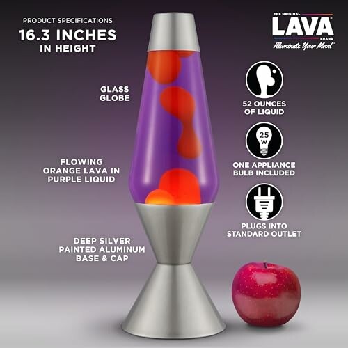 Lava lamp with orange lava in purple liquid next to an apple.