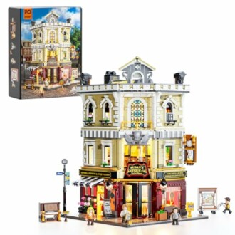 Lego antique shop building set with figures and box.