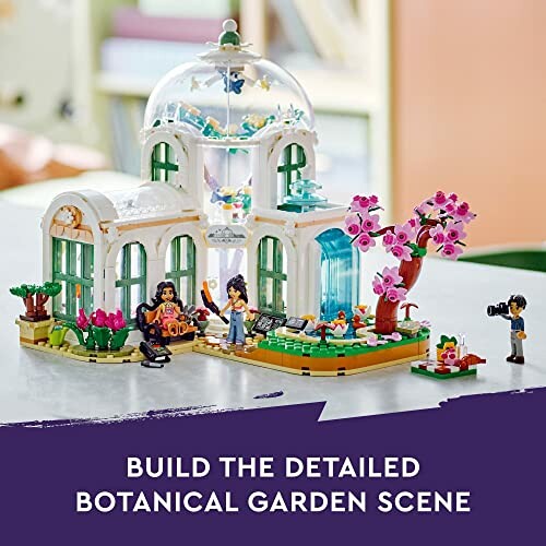 LEGO botanical garden scene with glass dome and pink tree.