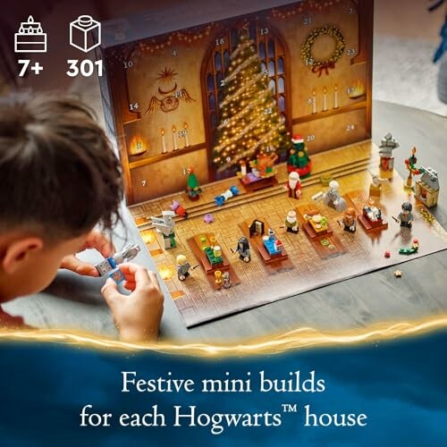 Child playing with LEGO Harry Potter advent calendar.