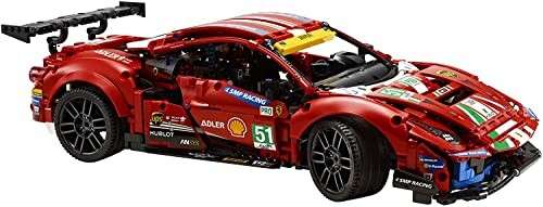 Red LEGO racing car model with detailed design.