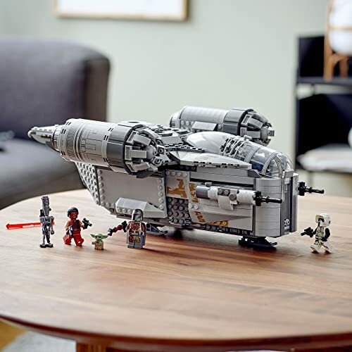 LEGO spaceship with mini figures on a table