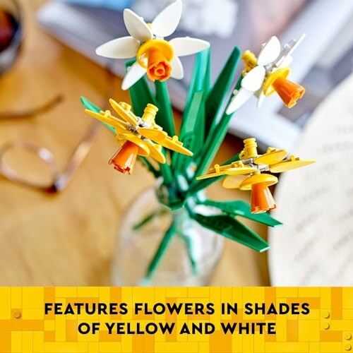 Lego flowers in shades of yellow and white in a vase