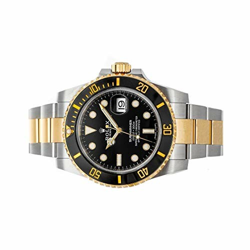 Luxury black and gold dive watch with date feature.