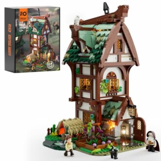 Medieval building LEGO set with detailed house and characters.