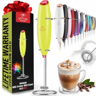 Colorful milk frother set with stand and latte.