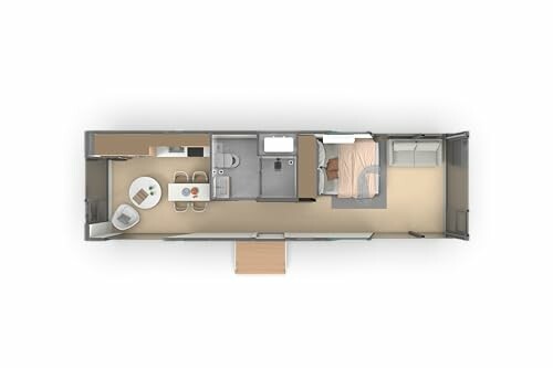 Top view of a mobile home interior layout with furniture and rooms.