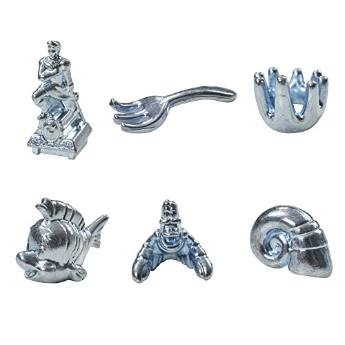 Silver Monopoly game pieces including a mermaid, fork, crown, fish, diver, and shell.