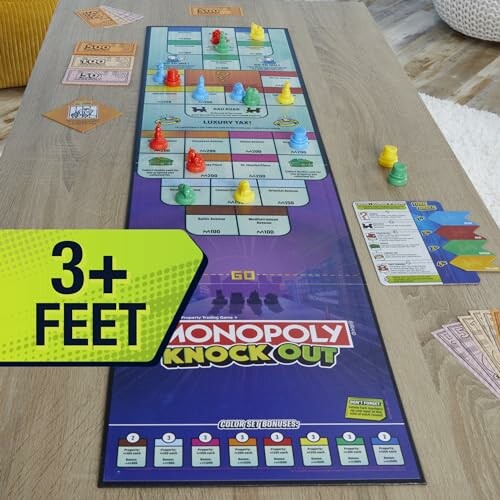 Monopoly Knockout board game setup with pieces and cards.