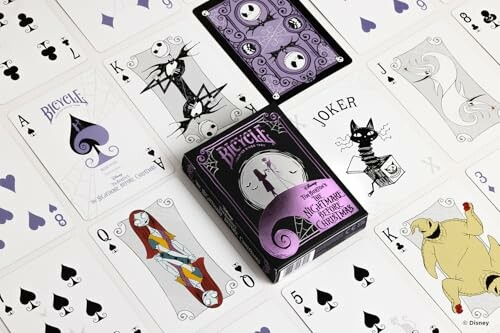 Nightmare Before Christmas themed playing cards spread out with a Bicycle card deck box.