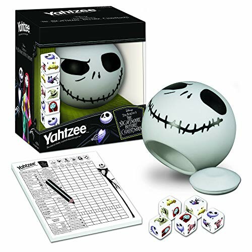 Nightmare Before Christmas Yahtzee game set with dice, scorecard, and themed cup.