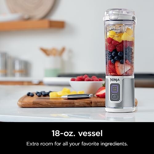 Ninja blender with fruits on a kitchen counter