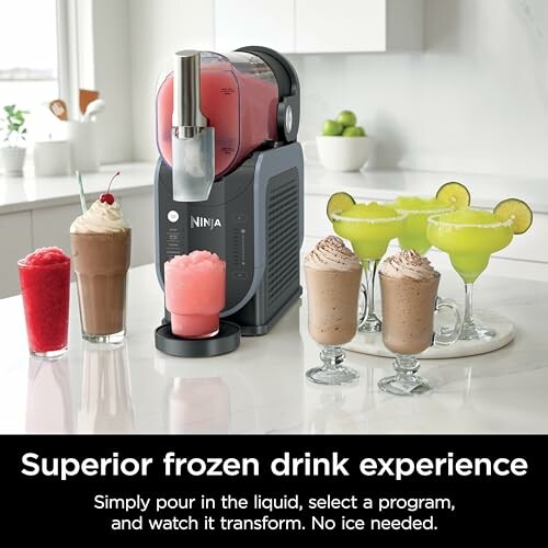 Ninja frozen drink maker with colorful beverages in glasses.