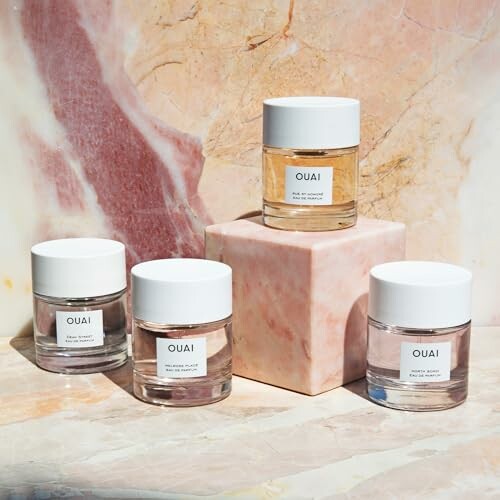 Ouai beauty products on a marble surface