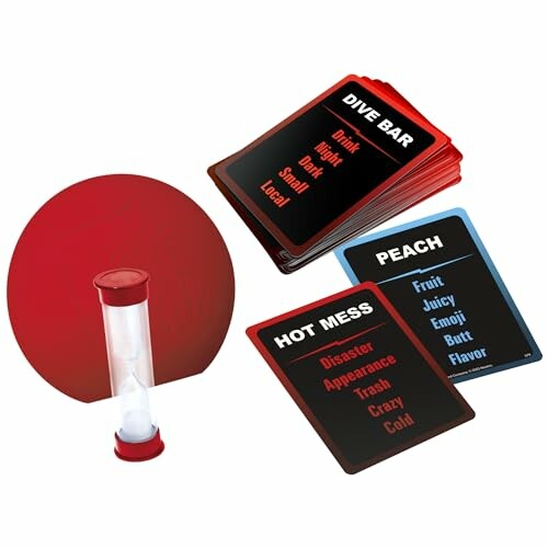 Party game components with cards and hourglass timer.