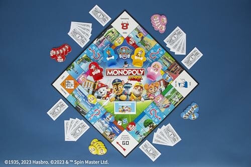 Paw Patrol themed Monopoly board game with character pieces and play money.