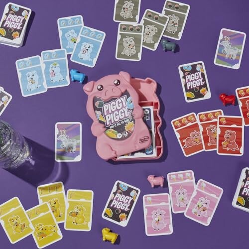 Piggy-themed card game setup on a purple table.