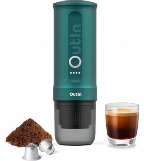 Portable espresso maker with coffee grounds, pods, and a cup of espresso.