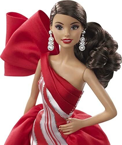 Doll in red and white striped dress with bow and earrings.