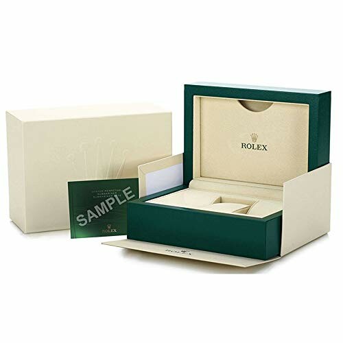 Rolex watch box with packaging and sample card.