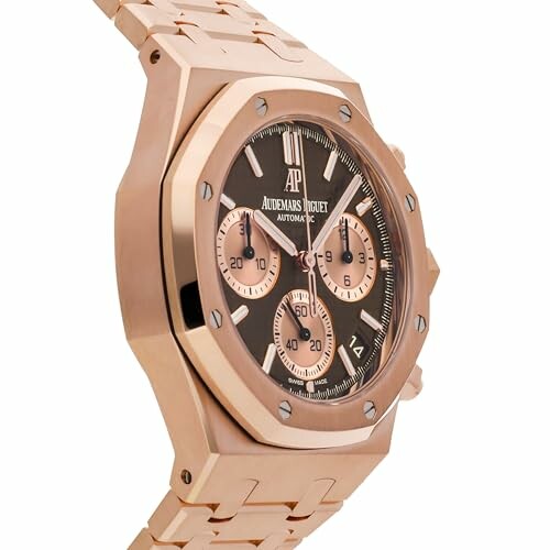 Rose gold luxury watch with chronograph.