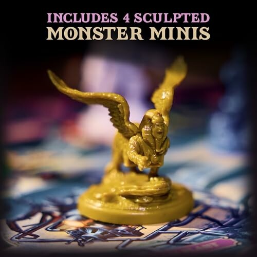 Golden sculpted monster mini with wings and two heads on a game board