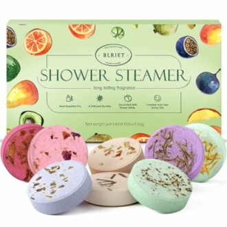 Colorful shower steamer tablets with fruits and herbs on packaging.