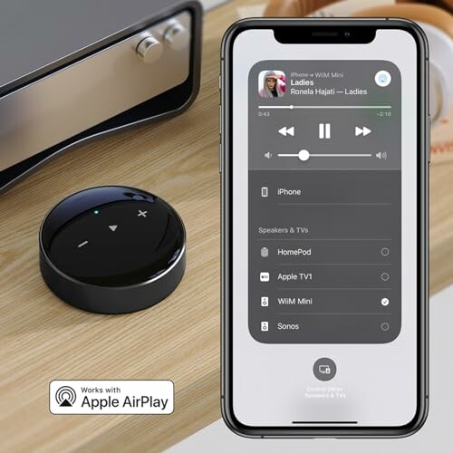 Smartphone displaying AirPlay speaker options next to a smart speaker.