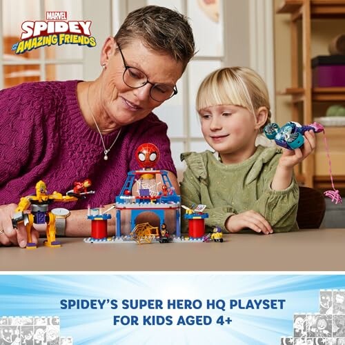 Grandmother and child playing with Spidey Super Hero HQ playset.