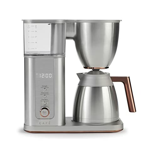 Stainless steel coffee maker with digital display and carafe.