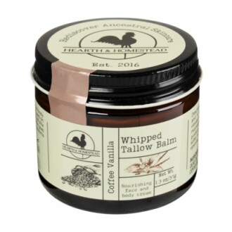 Hearth & Homestead Whipped Tallow Balm jar with coffee vanilla scent.