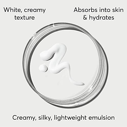 White creamy emulsion with silky texture in a clear container.