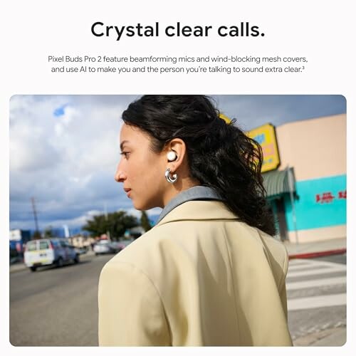 Woman wearing earbuds crossing the street.